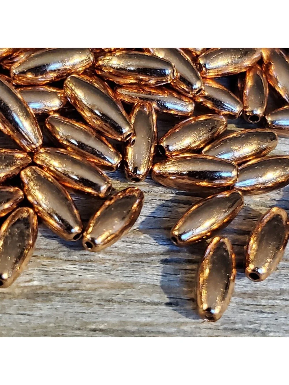 Bulk Pack of 50 Solid India Shiny Copper 9x4mm Smooth Oval Spacer Beads